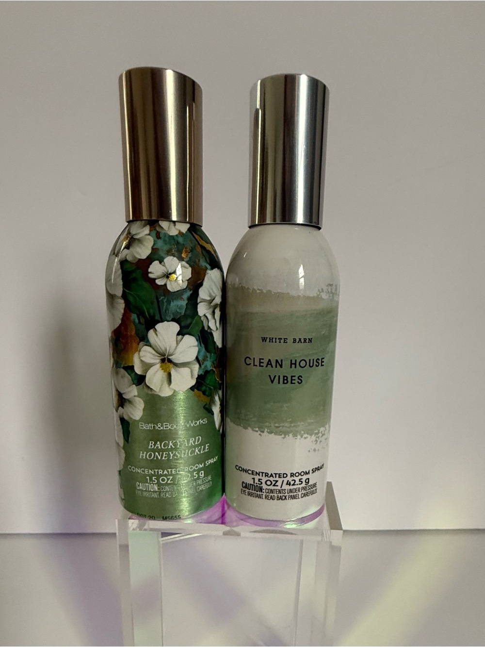 Bath & Body Works Backyard Honeysuckle and Clean House Vibes Room Sprays.